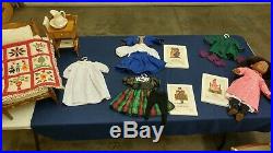 Addy American Girl doll, bed set, outfits, and books