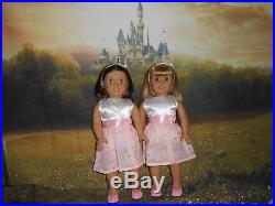 American Girl 18 Dolls GWEN AND CHRISSA GOTY 2009 with 2 beautiful outfits each