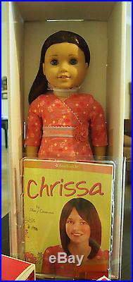 American Girl Doll Chrissa NRFB Plus 2 new outfits and 2 Books Doll of Year 2009