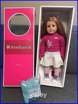 American Girl Mia in original Meet Outfit + extra set of practice clothes (new)