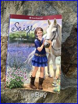 American Girl Saige 2013 girl of the year 18, three outfits, jewelry, and books