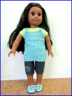 American girl doll Chrissa wearing her meet outfit. No box