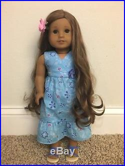 American girl doll Kanani with outfit and chair great condition