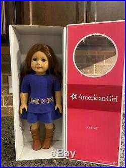 Retired American Girl Doll Saige in original box, ear rings, full outfit